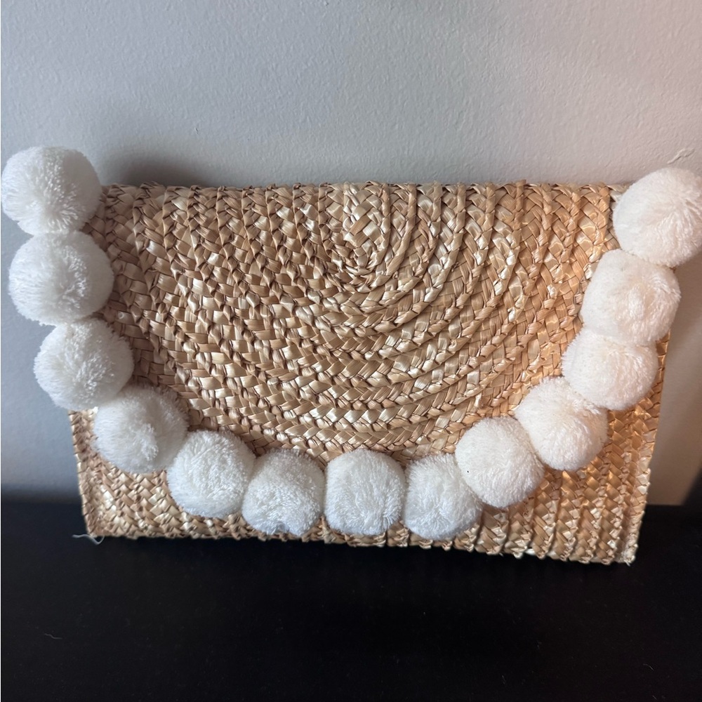 Woven Straw Clutch with White Pom Poms
